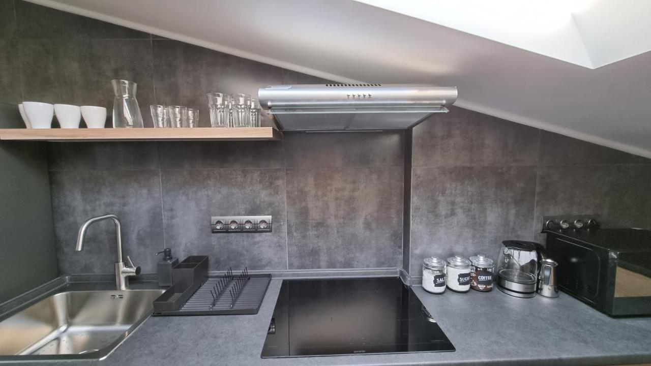 Apartamento Mansarda Kamianets-Podilskyi Exterior foto