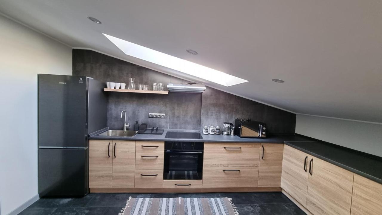 Apartamento Mansarda Kamianets-Podilskyi Exterior foto