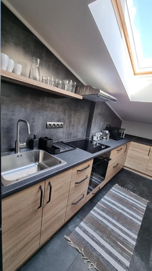 Apartamento Mansarda Kamianets-Podilskyi Exterior foto